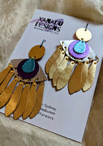 Crying eyes statement earrings made from metallic leather